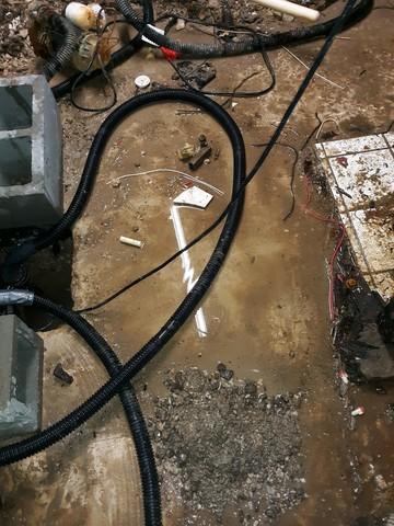 The previous "sump system" worked like a band-aid on a bullet wound. It clearly did not prevent the basement from flooding, causing a huge mess.