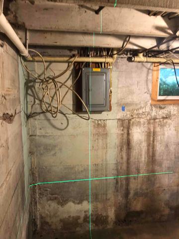 Before Photo - Cracked and Wet Walls