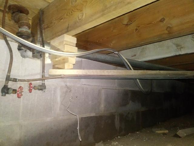 Before Photo - Shifted Crawl Space Walls