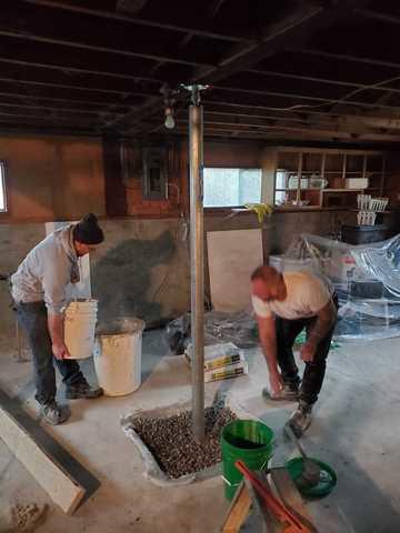 <p>Pouring buckets of engineered fill&nbsp;</p>