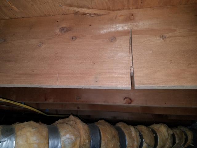 Upon inspection, Mike noticed several of the beams had started cracking from the weight of the floor joist above.