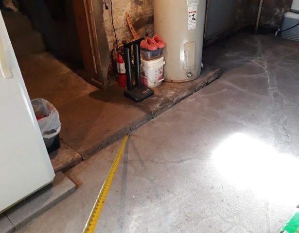 Uneven Concrete Slab Allows Water to Collect