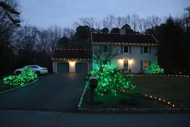 Her husband's favorite colors are green and white, so we made sure to utilize those colors in the lighting!