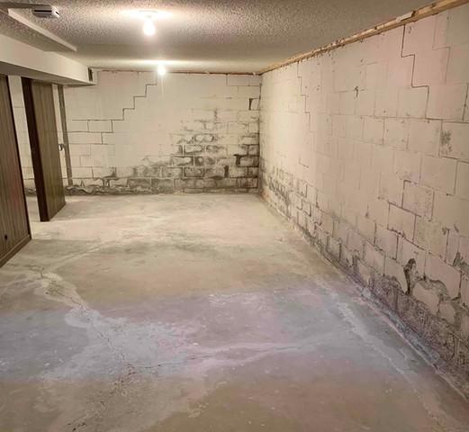 Water was leaking through the deteriorating foundation wall, causing the homeowners to worry about the value of their home.