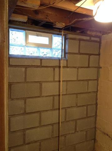 <p>The brand new wall is waterproofed from the outside and can support the home, unlike the old bowing wall.</p>