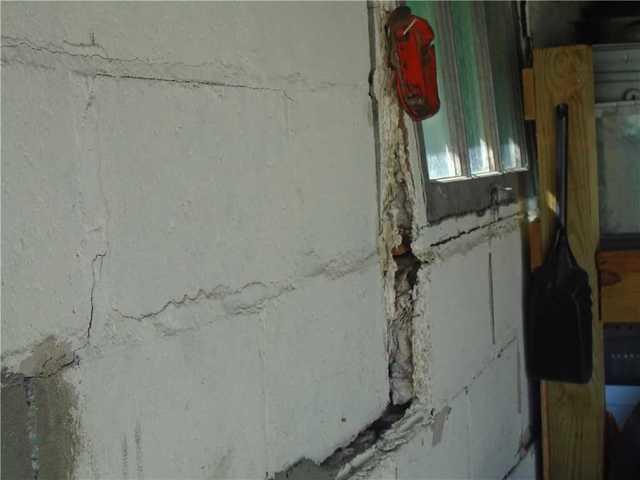 Bowing Wall Pushing Window