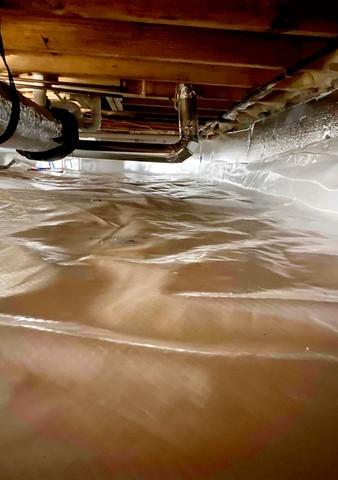 CleanSpace Vapor Barrier installed to prevent moisture from passing through the crawl space ground and walls