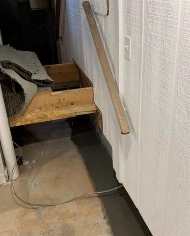 Pulling back the staircase was the best way to install waterproofing underneath them. When the stairs are put back into place, our system will continue to protect the home from water seepage.