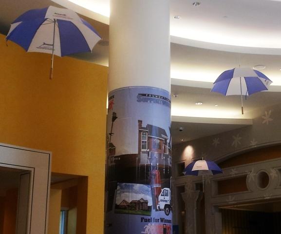 Imagine walking into the Marriott; looking up and seeing our trademark umbrellas hanging from the ceiling.
