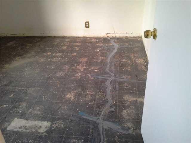 More cracks are repaired to close any remaining gaps in the slab and create a final finished look.