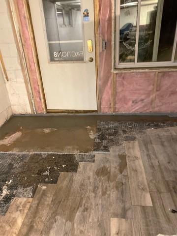 Removed Flooring to Install Drain System