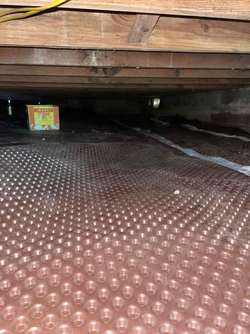 Drainage Matting installed to direct any water on the crawl space floor to a drainage system