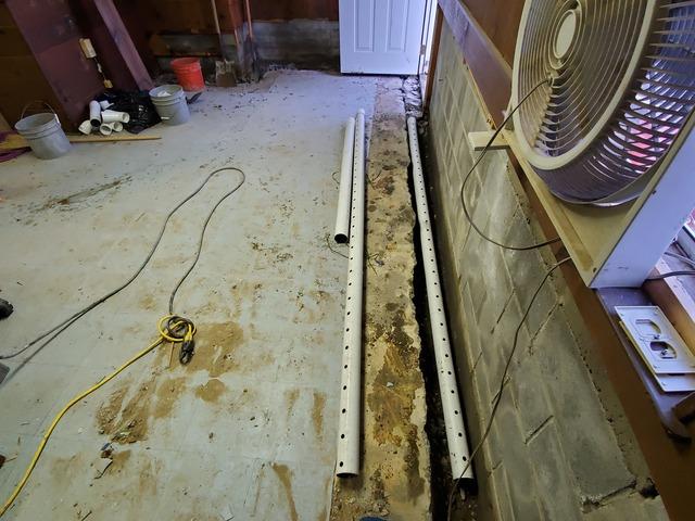 Starting To Lay Piping and Gravel Along The Right Wall