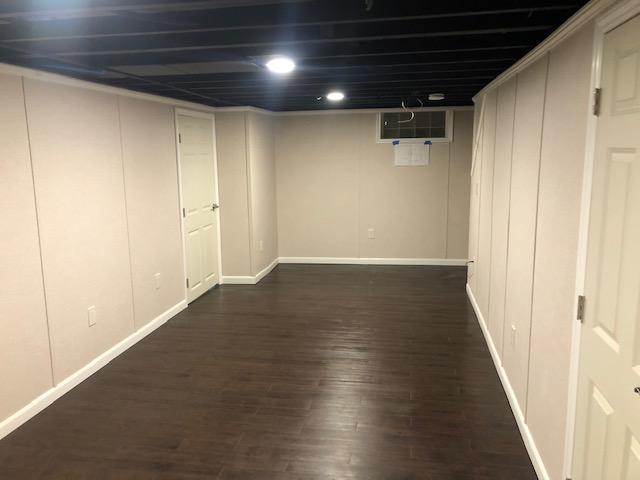 Our EverLast Walls, Elite Plank Flooring, and 6 Panel Doors look fantastic in this basement. The overhead recessed lighting in the painted ceiling makes this space glow.