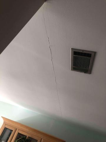 The homeowner noticed cracks on their walls, signifying there was something wrong with their home.