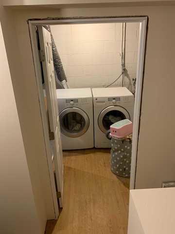 The family wanted a space designated for laundry in this new space.