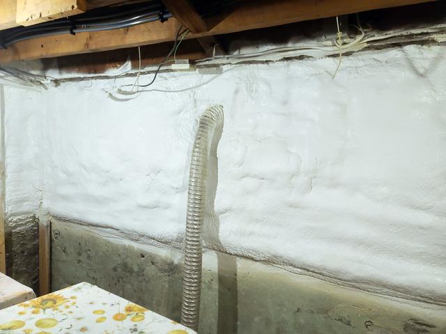 Weatherizing your basement with Spray Foam Insulation in St. Albans, Vermont.