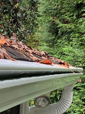 The Gutter Shutter System keeps leaves and debris but allows water in by displacing the surface tension preventing clogs and overflowing gutters.