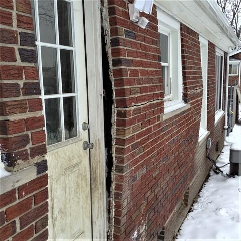 Bowing, Cracked, Leaky Foundation Wall Repaired in Caro, MI