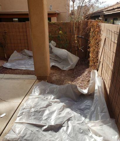 Before we even start digging, we lay down plastic to protect the existing landscaping.  We pride ourselves on treating each project and Homeowner as if there were family.