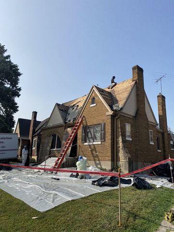 Team Stripping Roof to Wood Base