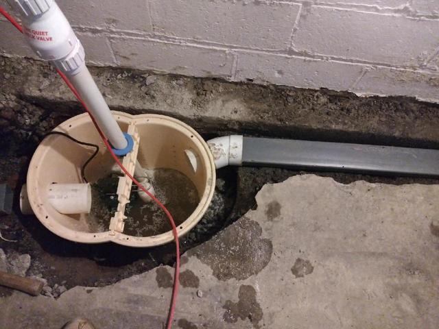 <p>WaterGuard feeds directly into the TripleSafe liner to get water quickly out of the basement. The holes in the liner also allow water to drain down into the ground.</p>