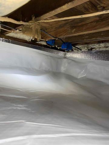 Our CleanSpace vapor barrier is a durable, bright white crawl space liner that installs on the walls and floors, preventing water vapor and humidity from passing through.