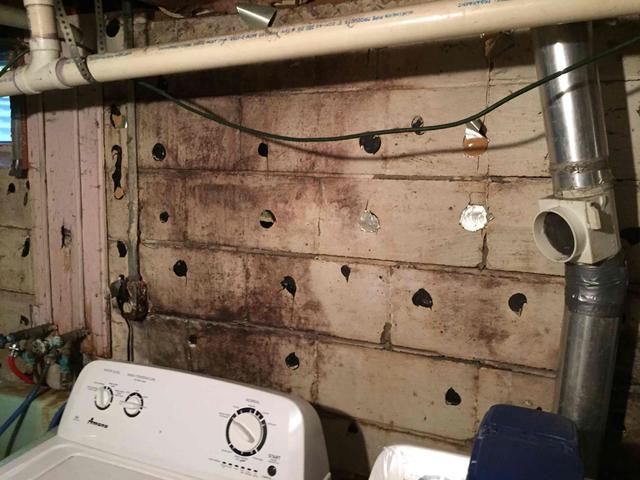 Bowing Wall Behind Washer and Dryer