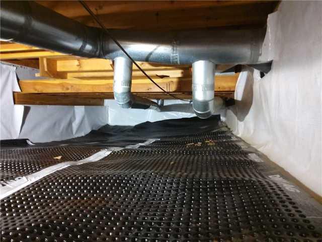 Drainage Matting Captures Water Entering Crawl Space