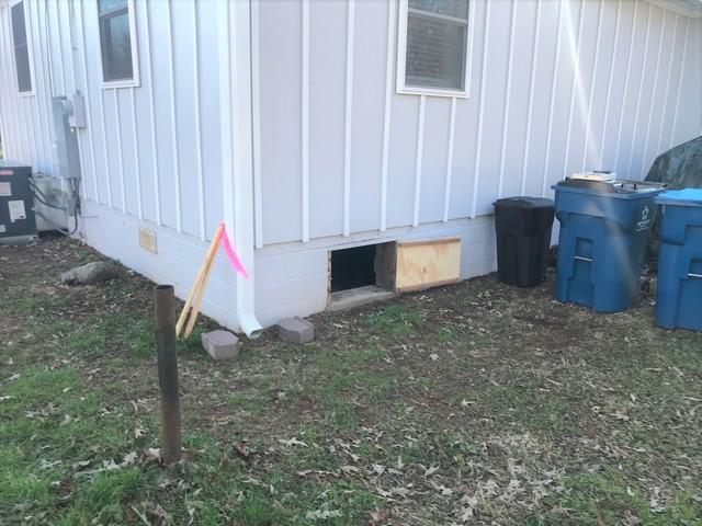 The drainage from these downspouts were soaking into the ground directly against the crawl space.