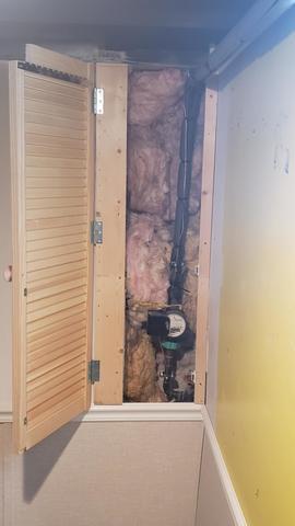 Door Installed Over The Pipe Access Panel