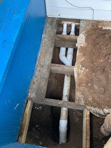 Here, our team rebuilt the sump pump discharge line, fitting it with IceGuard to allow water to exit the discharge line even in the event of freezing temperatures and a clogged discharge line.