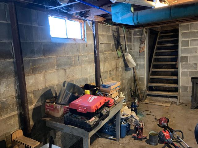 The basement had water intrusion and existing beams were failing