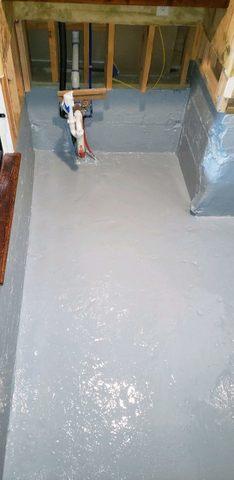 This shows the PermaFlex waterproofing and the molded drywall was removed.