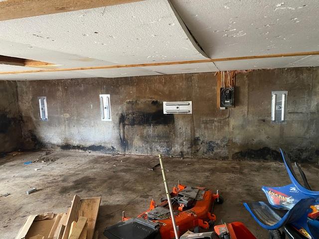 This garage's walls are now stabilized and the owners can move forward with their plans of converting it into a workshop space.