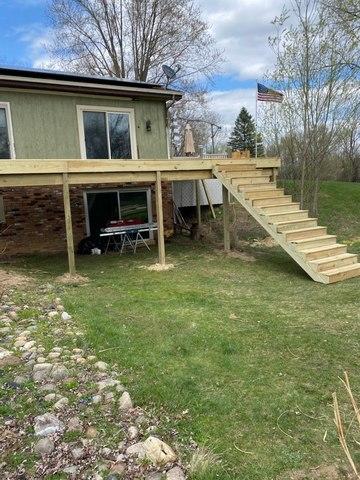 before the railings were installed on the deck and stairs