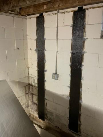 Our crew applied our CarbonArmor strips with epoxy. Epoxy helps with the pressure and reinforces the strip to the wall.