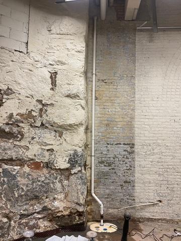 Sump Basin Installed with Discharge Line