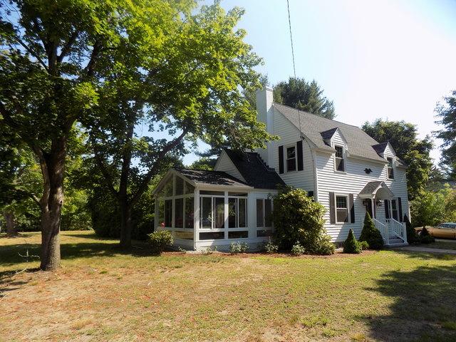 The sunroom had roof shingles to match the existing home, and many windows on three sides to allow for lots of natural light.