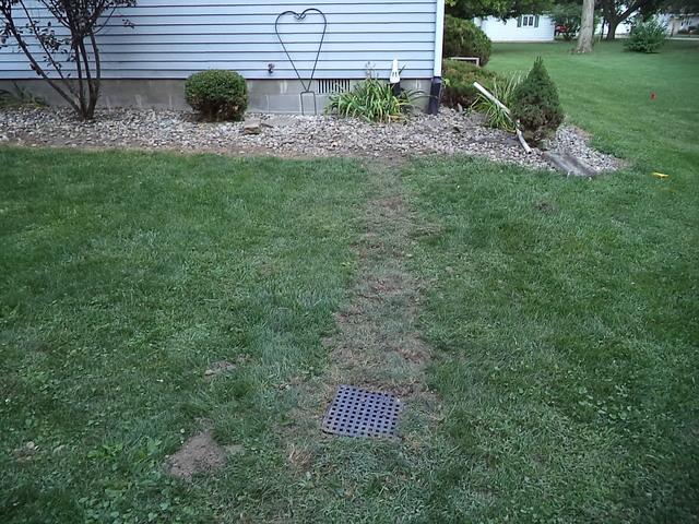 This is the discharge we placed in the yard to pull the groundwater discharge away from the foundation.