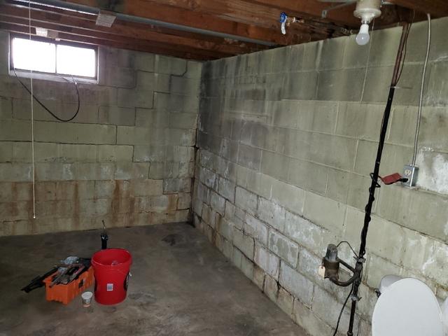 Before Photo - Cracked and Bowing Walls