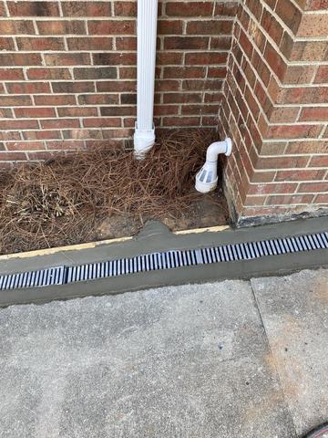 Side Drainage in Concrete Driveway