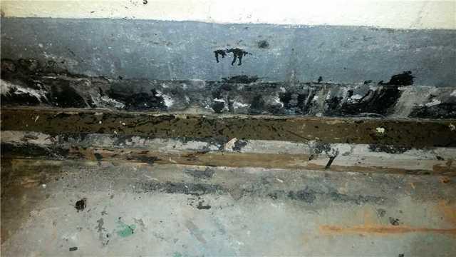 Water Damage along the bottom of a wall