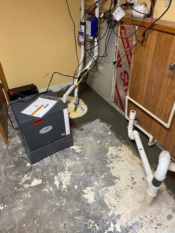 A dehumidifier and sump pump were installed to ensure the basement stays dry all the time.