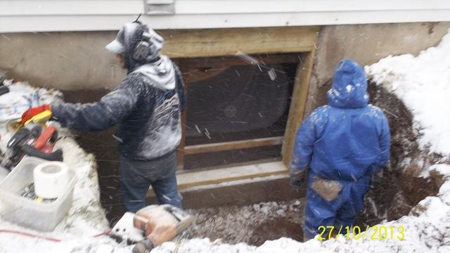 A new frame is then installed to house the new window, and the old frame of the basement is removed. 