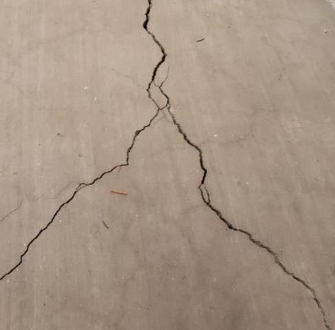 Splitting Concrete crack on the floor