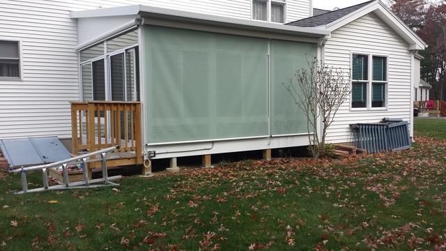 The homeowners love their new motorized shade.