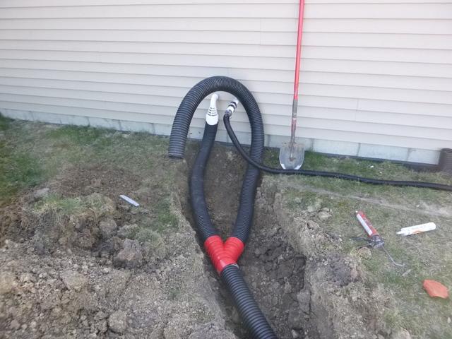 We buried the discharge lines for the sump pumps and ran them ninety feet away from the property.