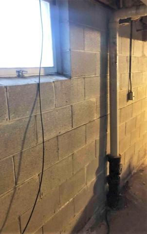 Moving Block Wall in Duluth, MN Basement