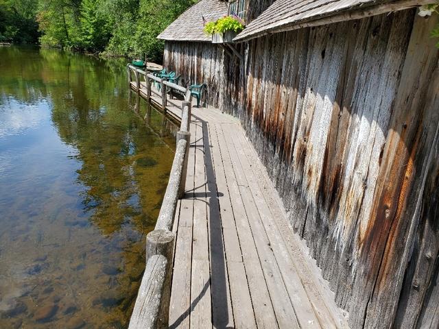 Wrap-around Porch and Boathouse